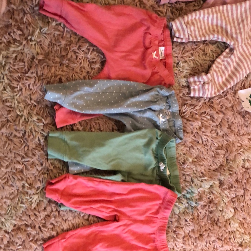 4 pairs of 6 months pants.